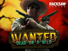 Wanted Dead or A Wild: cowboy with guns against large moon
